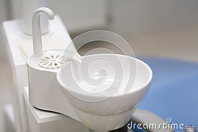 White washbasin in dentist clinic. Stomatological equipment Stock Photo