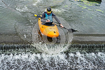 Bedford,Bedfordshire,UK,August 19, 2018. White water kayaking in the UK, quick reactions and strong boat control skills. Editorial Stock Photo