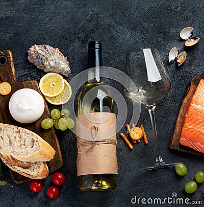 White wine Pinot Grigio with seafood and snacks Stock Photo