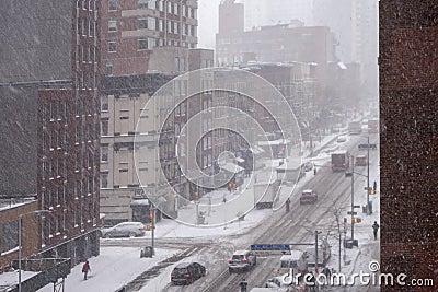 White winter snow fall day in the big apple new york city manhattan buildings streets and walkways Editorial Stock Photo