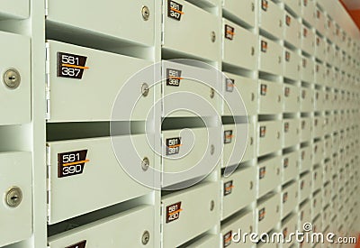 White wood postboxes service in apartment Stock Photo