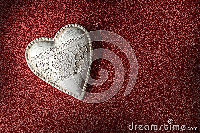 White wood valentine heart on red background, valentines day or celebrating love Stock Photo