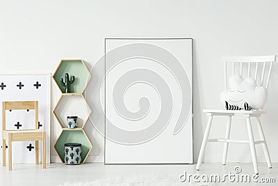 White and wooden chair in kid`s room interior with mockup of emp Stock Photo