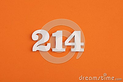 Number 214 - On orange foam rubber background Stock Photo