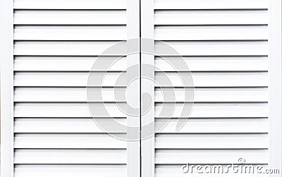 White wooden shutters to protect windows from sunlight Stock Photo