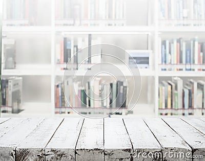 White wooden texture tabletop on blur library Stock Photo