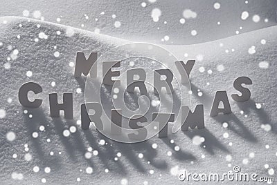 White Word Merry Christmas On Snow, Snowflakes Stock Photo