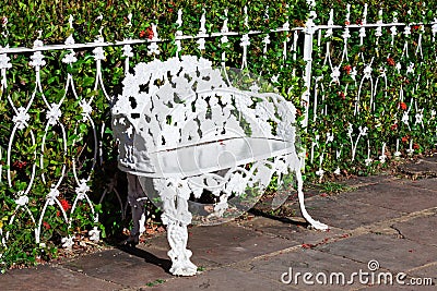 White wrought iron bench Stock Photo