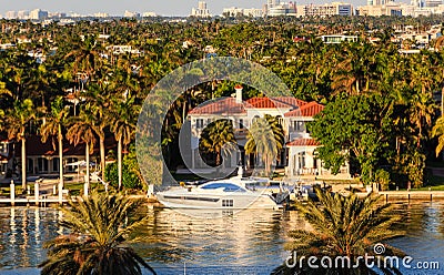 White Yacht by Miami Mansion Stock Photo