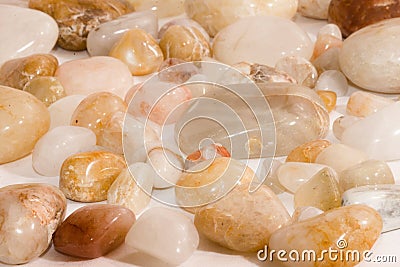 White and Yellow Smooth Quartz River Rocks Tumbled Stock Photo