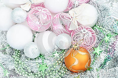 White and yellow xmas ornaments and Christmas balls on glitter h Stock Photo