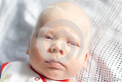 Whitehair babyboy with albinism syndrome Stock Photo