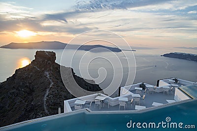 Whitewashed House on Cliffs with Sea View and Pool in Imerovigli, Santorini, Greece Stock Photo