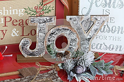 Whitewashed wood Tabletop Christmas JOY cutout letters Stock Photo