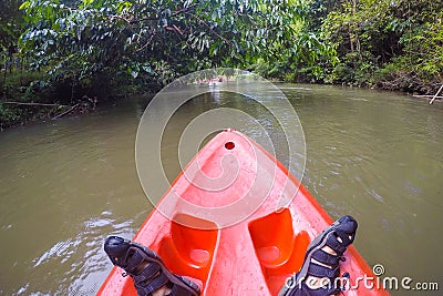 A whitewater kayaker while wave on the river in Satun province, Stock Photo