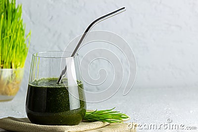 Whitgrass in a glass. Wheatgrass juice. healthy eating trend Stock Photo