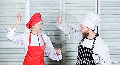Who cook better. Culinary battle concept. Woman and bearded man culinary show competitors. Ultimate cooking challenge Stock Photo