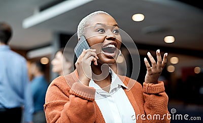 Who could forget the moment they made their first million. a young businesswoman using a smartphone and looking shocked Stock Photo