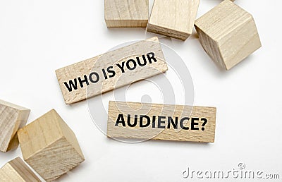 WHO IS YOUR AUDIENCE on wooden blocks on white background Stock Photo