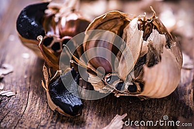 Whole balsamic black garlic Stock Photo