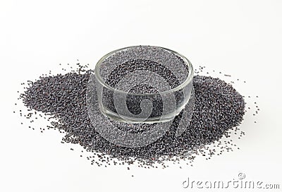 Whole black poppy seeds Stock Photo