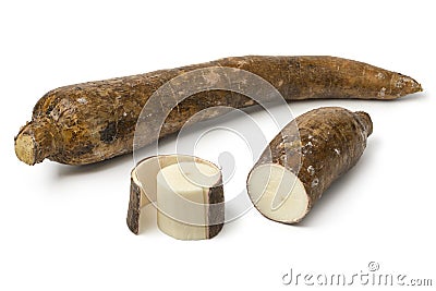 Whole Cassava root and a peeled piece Stock Photo