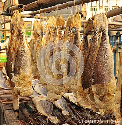 Whole dried fish in a Chinese market stand Stock Photo