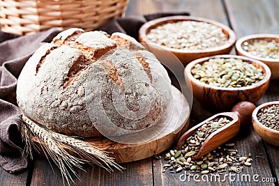 Whole grain bread with seeds of sunflower, pumpkin, flax and hemp Stock Photo