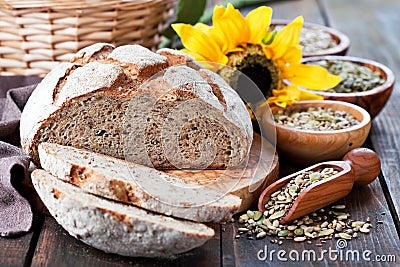 Whole grain bread with seeds of sunflower, pumpkin, flax and hemp Stock Photo