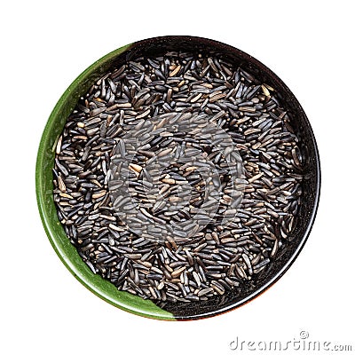 Whole-grain niger seeds in round bowl isolated Stock Photo
