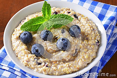 Whole grain oat porridge Stock Photo