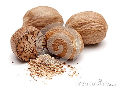 Whole and grated nutmeg isolated on white Stock Photo
