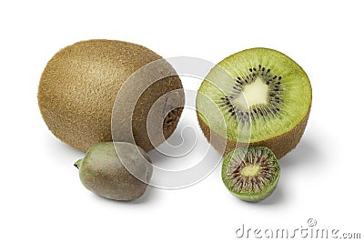 Whole and half kiwi fruit and kiwi berry Stock Photo