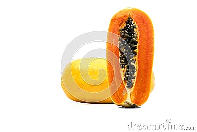 Whole and half of ripe papaya fruit with seeds isolated on white Stock Photo