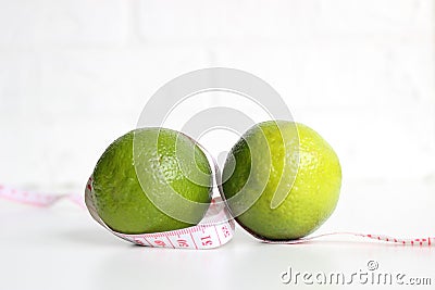 whole and half with slice of fresh green lime on white background Stock Photo