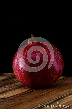 Whole organic pomegranate Stock Photo