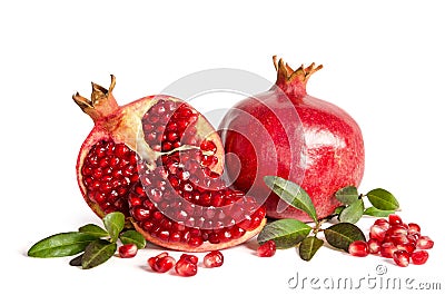 Whole Pomegranate and two parts of Pomegranate with leaves and seeds on white Stock Photo