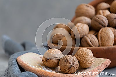 Whole raw walnuts, healthy ingredients, vegan and vegetarian food Stock Photo