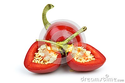 Whole round red hot pepper and two halves Stock Photo