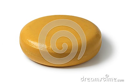 Whole round yellow Gouda cheese Stock Photo