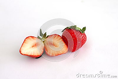 Whole and sliced piece strawberry fruit. Stock Photo