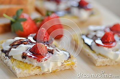 Bread and canape with strawberry topping Stock Photo
