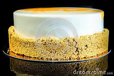 whole musk cake on black background Stock Photo