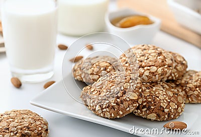 Wholegrain biscuits milk and almonds Stock Photo