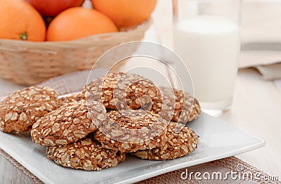 Wholegrain cookies, milk and fruits Stock Photo