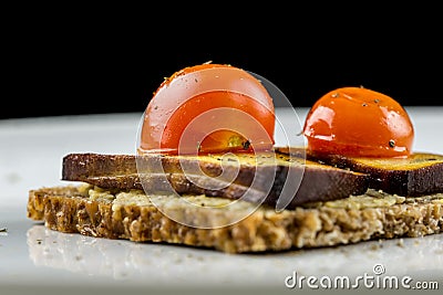 Wholewheat bread with tofu and tomato Stock Photo