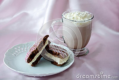 Whoopee pie and hot chocolate Stock Photo