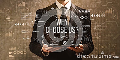 Why choose us with businessman holding a tablet computer Stock Photo