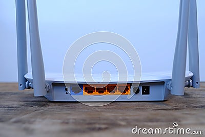 Wi-Fi router output ports close-up, modern wireless Router with four non-removable external antennas for better search and signal Stock Photo