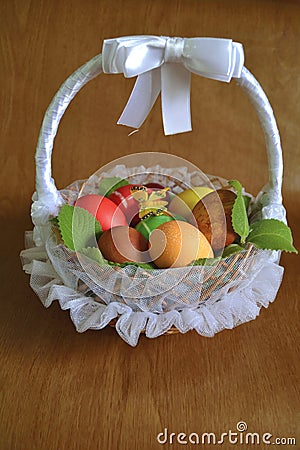 Wicker basket with Easter eggs Stock Photo